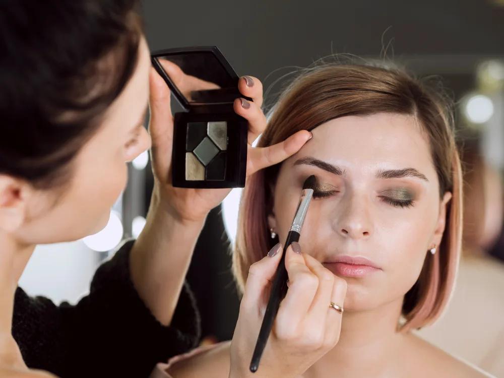Medical aesthetics graduate at work